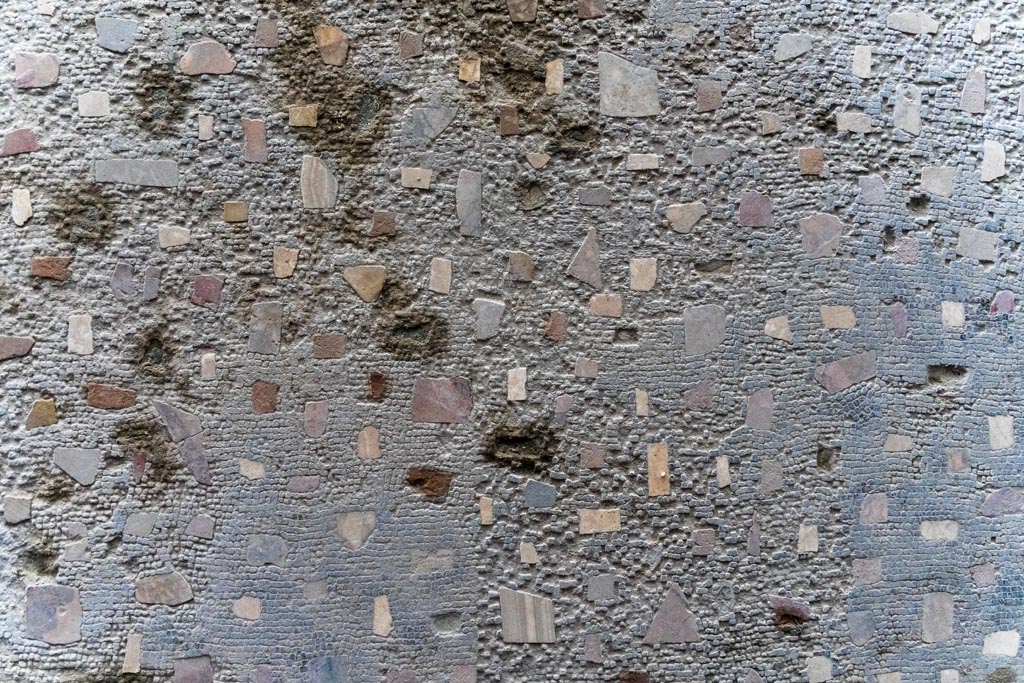 Herculaneum Villa dei Papiri. October 2023. Atrium (c), coloured chippings in atrium floor. Photo courtesy of Johannes Eber.